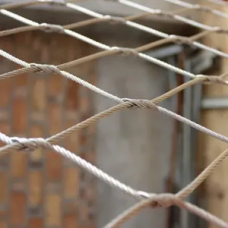 Сетка нержавеющая тросовая с узловым креплением и ромбической ячейкой Н2 7х7 AISI 316 20х35х1 мм